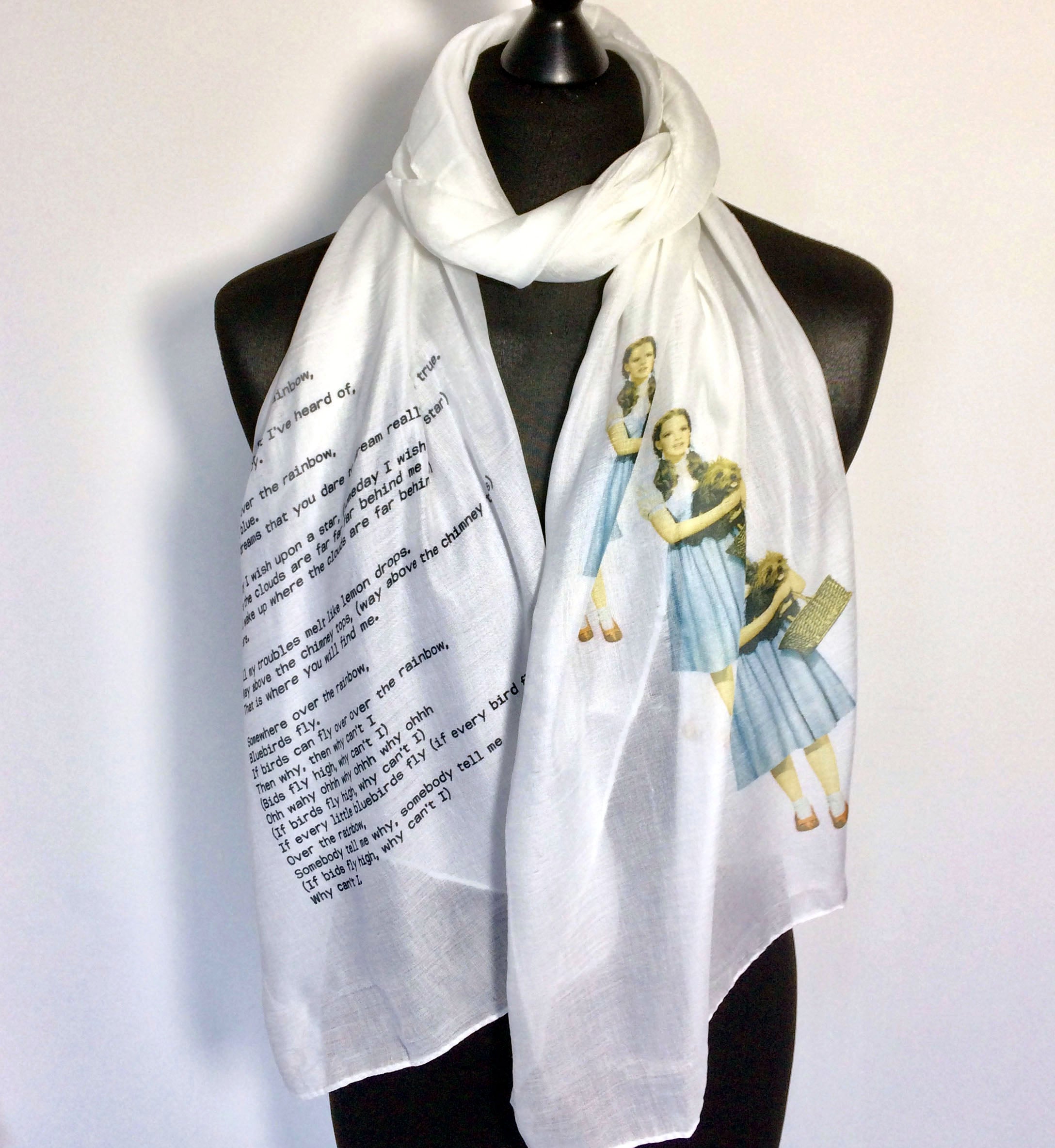 Wearable art scarf featuring Wizard of Oz Over the Rainbow print and Dorothy and Toto art