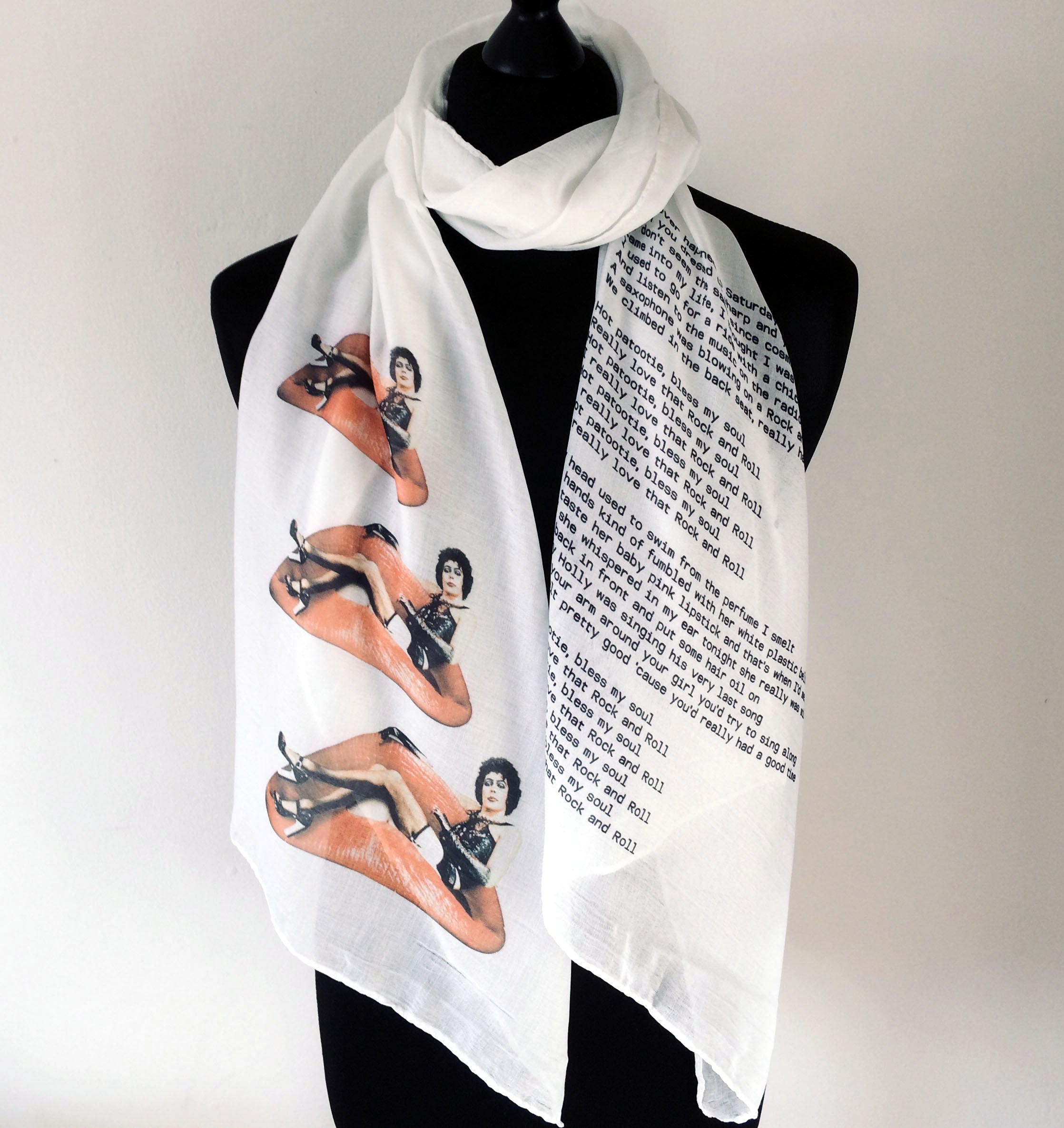 Wearable art scarf featuring the rocky horror picture show Hot Patooties lyics and Dr Frank n Furter art