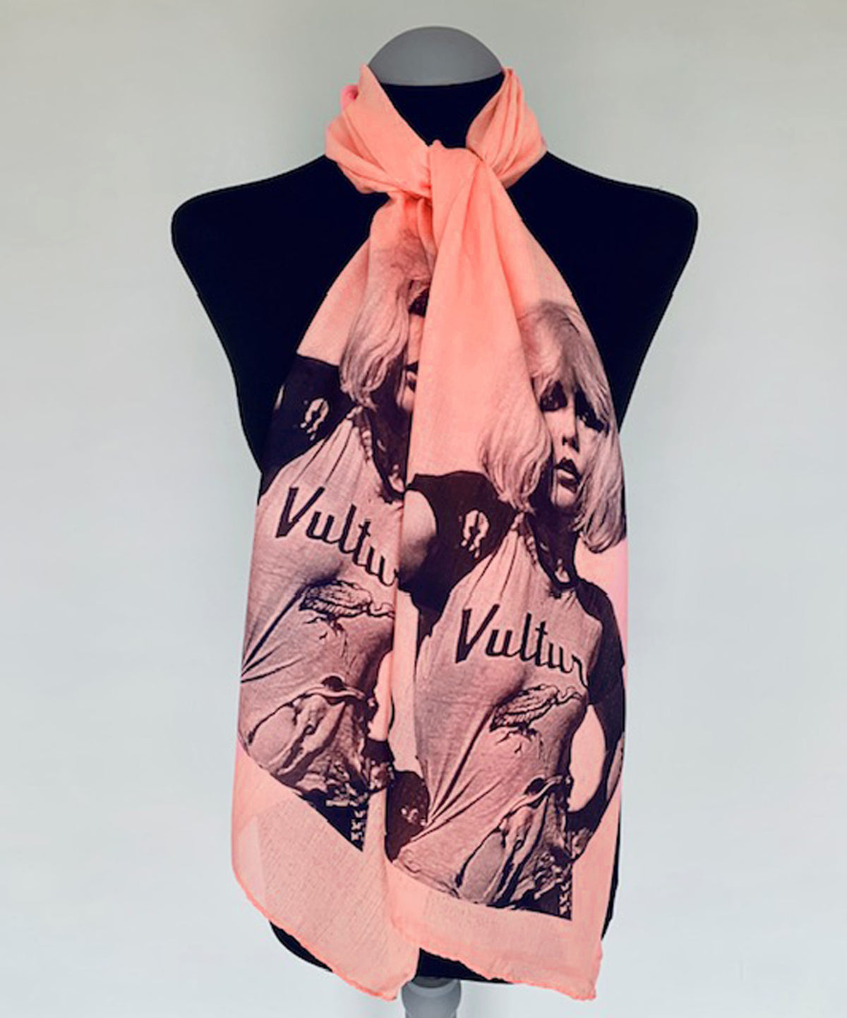 a vintage debbie harry Blondie print on long peachy pink scarf