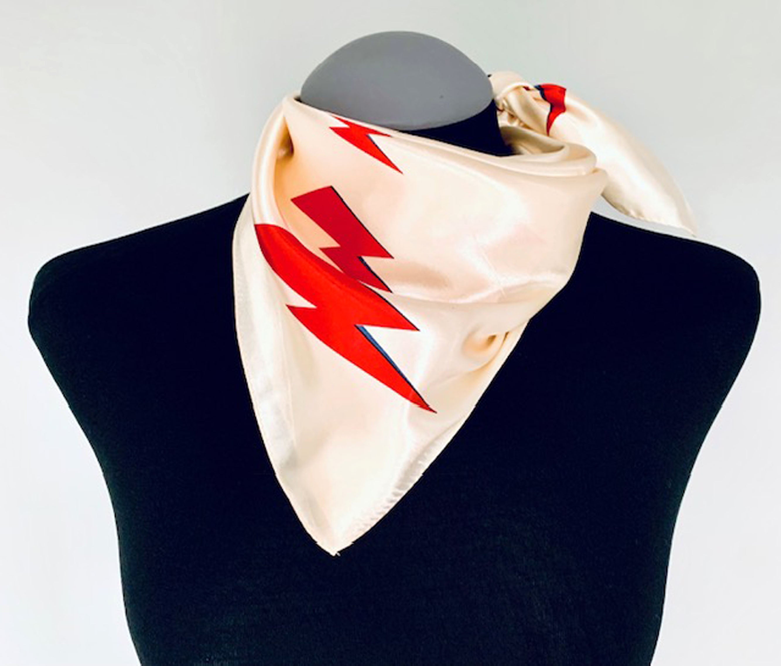 david bowie inspired cream satin square scarf with iconic ziggy stardust red lightening bolts print