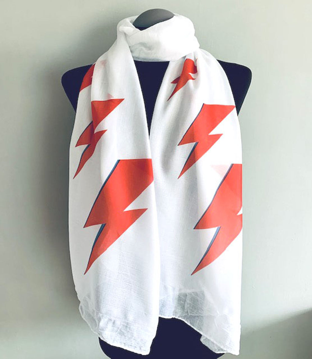 long white scarf with red lightening bolts print