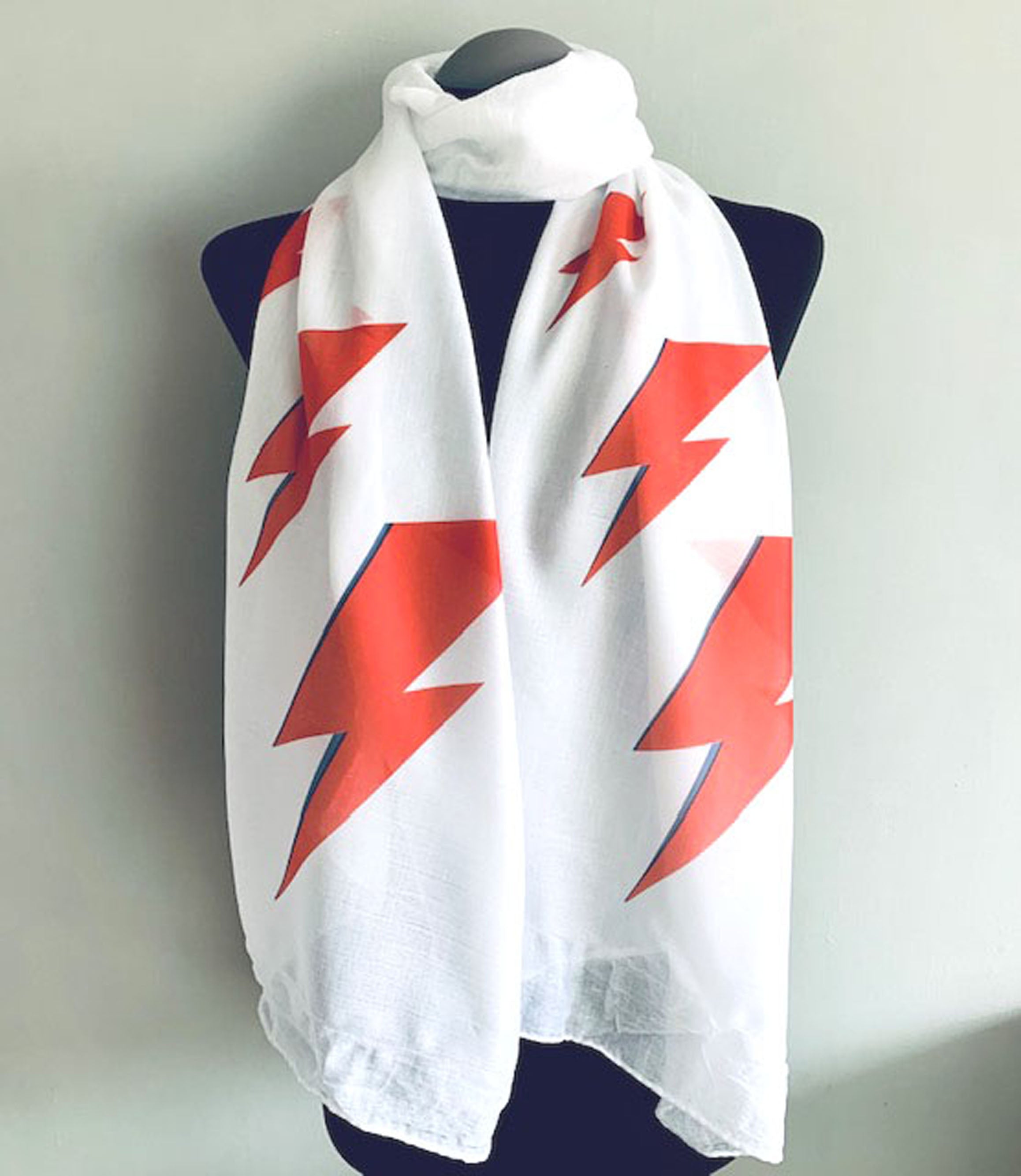 long white scarf with red lightening bolts print