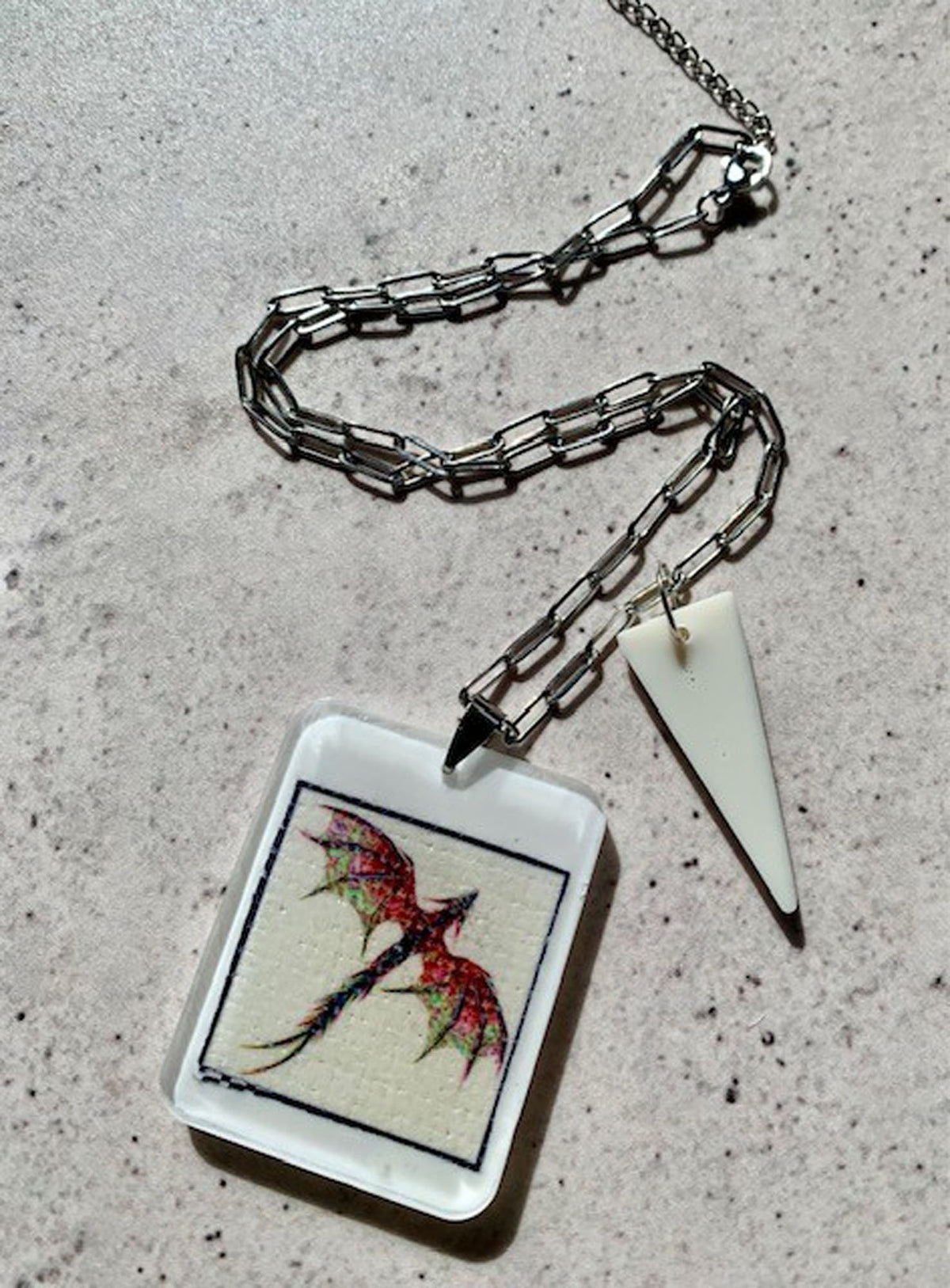necklace with hand crafted ivory resin pendant with original dragon artwork embedded