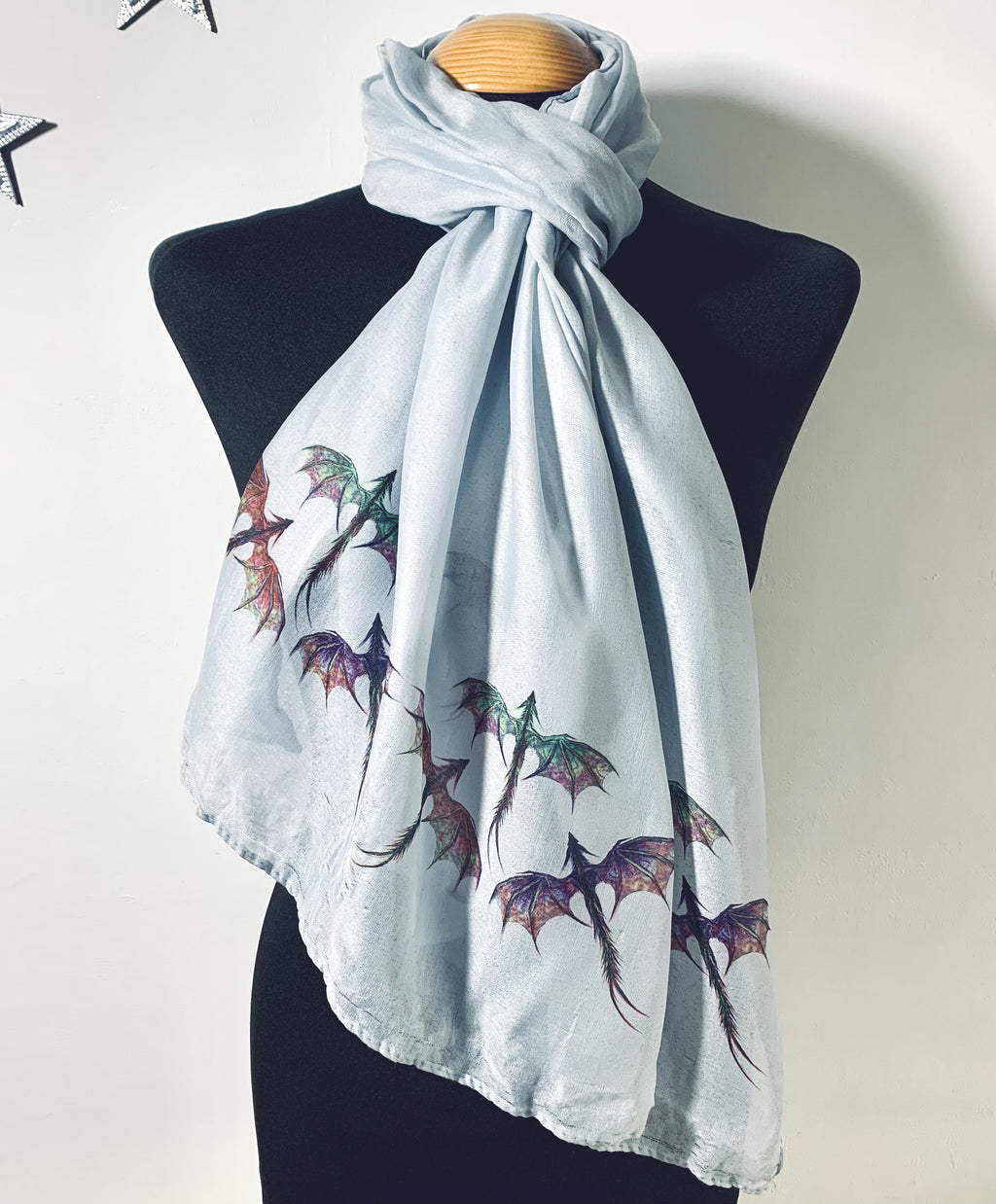 Wearable art scarf with delicate colorful dragon print