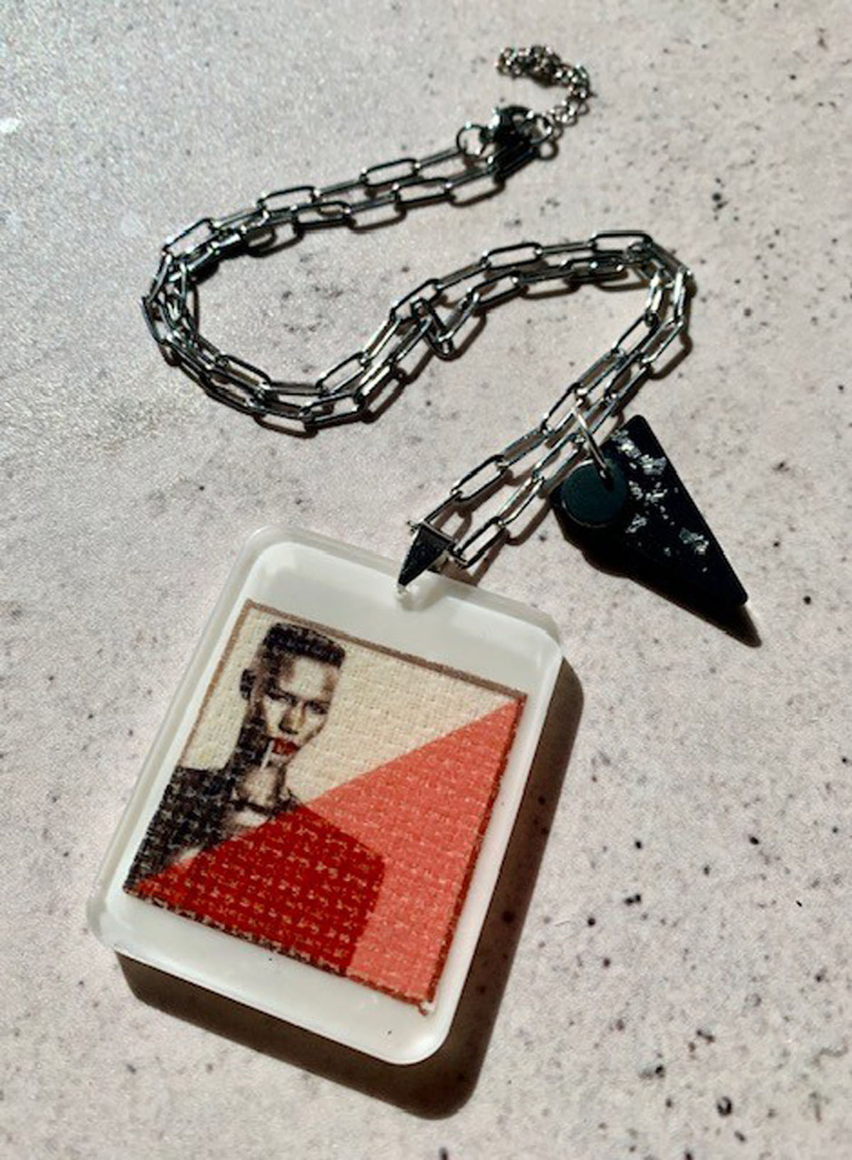 hand crafted ivory resin pendant necklace with grace jones portrait encased