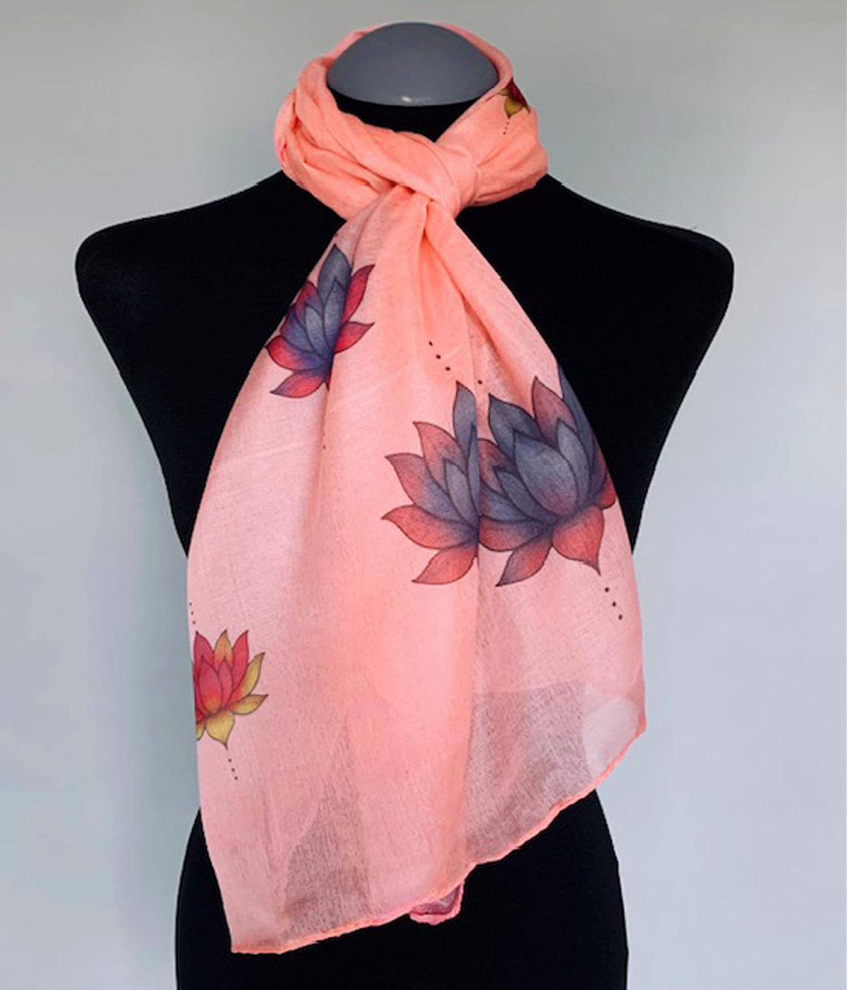 lotus flower print on a peach pink long scarf