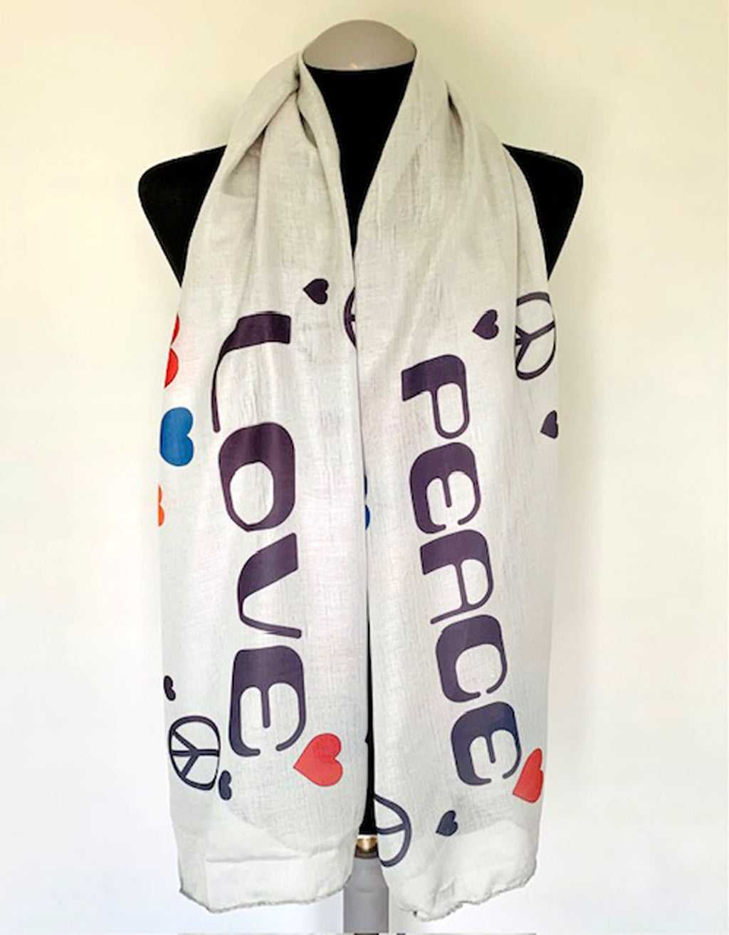 Long grey scarf with 'LOVE' and 'PEACE' design with hearts