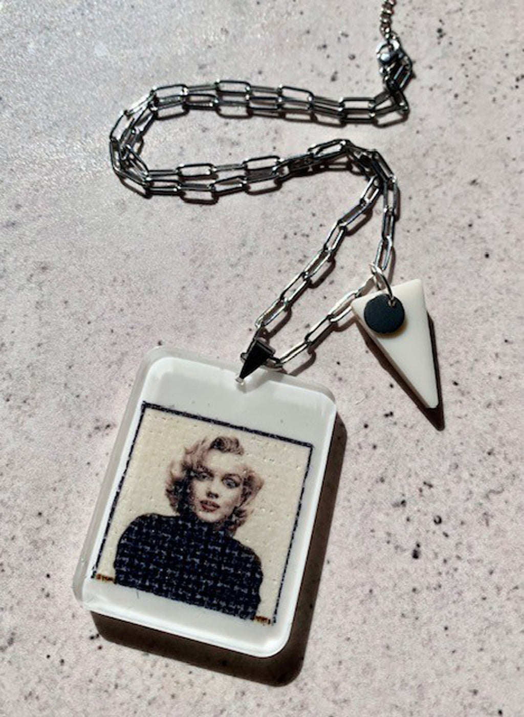 necklace with hand crafted ivory resin pendant with marilyn monroe portrait encased