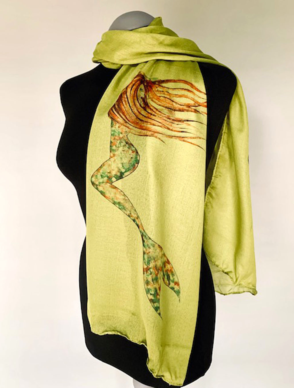 long olive green scarf with mermaid print