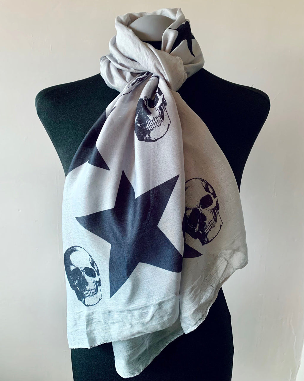 Wearable grey art scarf with skulls and stars print