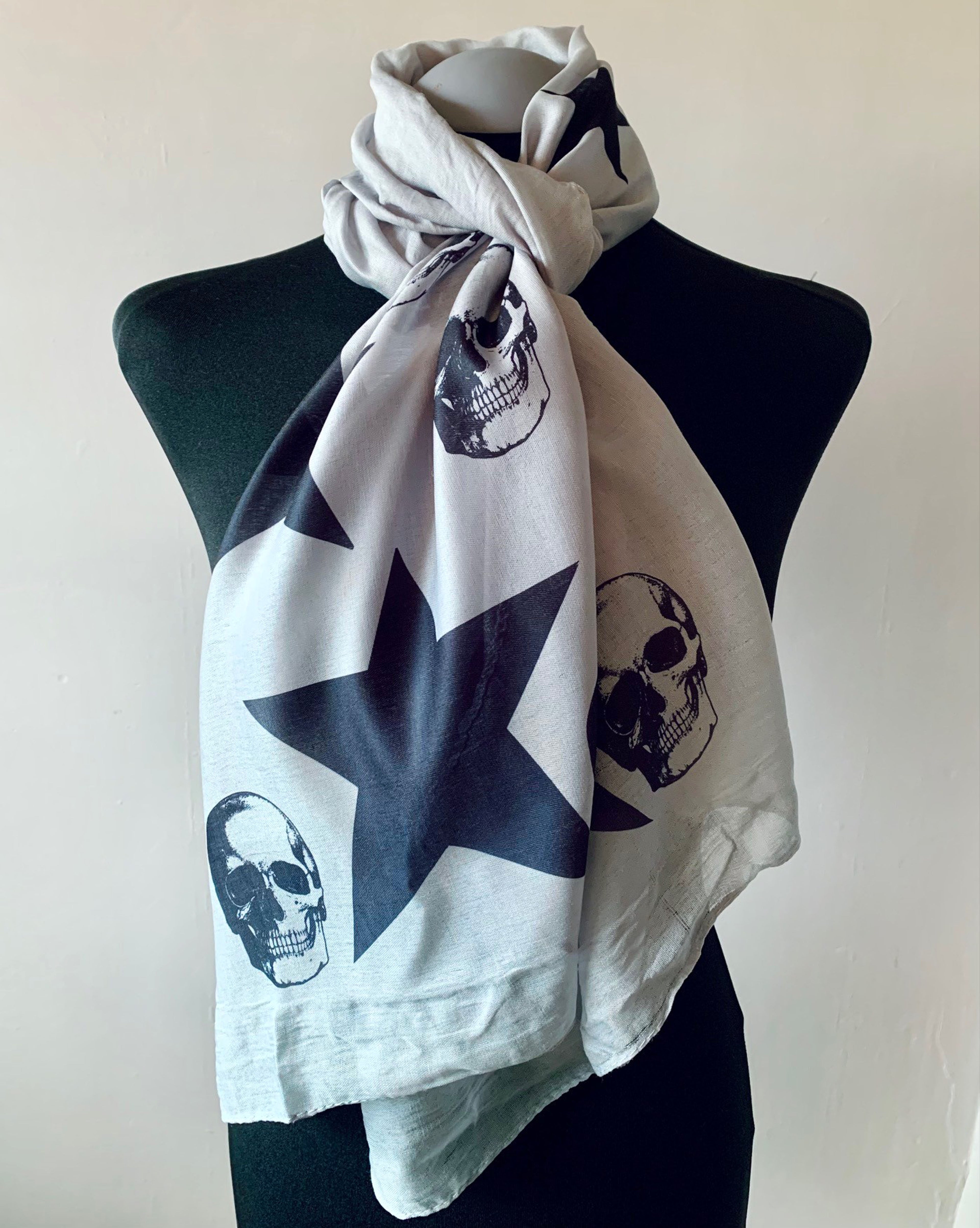Wearable grey art scarf with skulls and stars print
